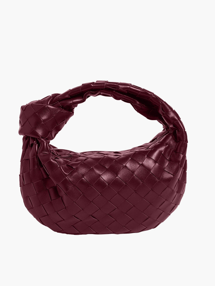 "Mini sac à main tissé artisanal élégant, design moderne, matériaux durables, accessoire féminin polyvent."