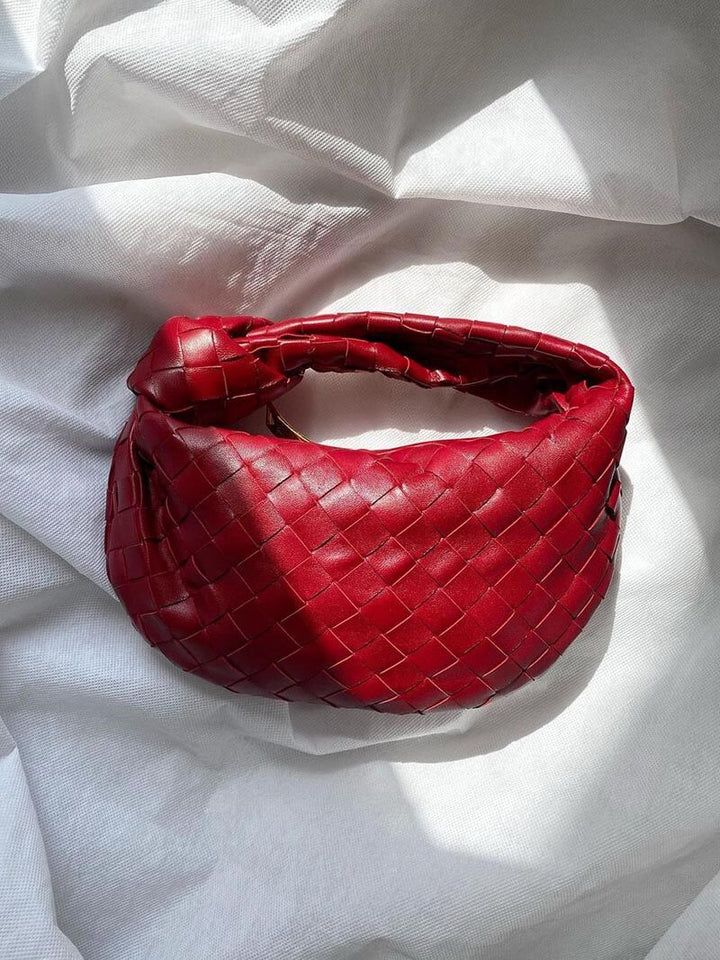 "Mini sac à main tissé artisanal élégant, design moderne, matériaux durables, accessoire féminin polyvent."