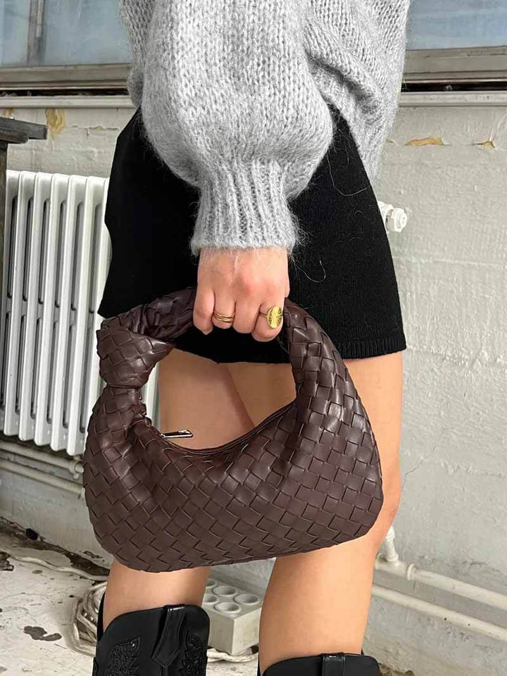 "Mini sac à main tissé artisanal élégant, design moderne, matériaux durables, accessoire féminin polyvent."