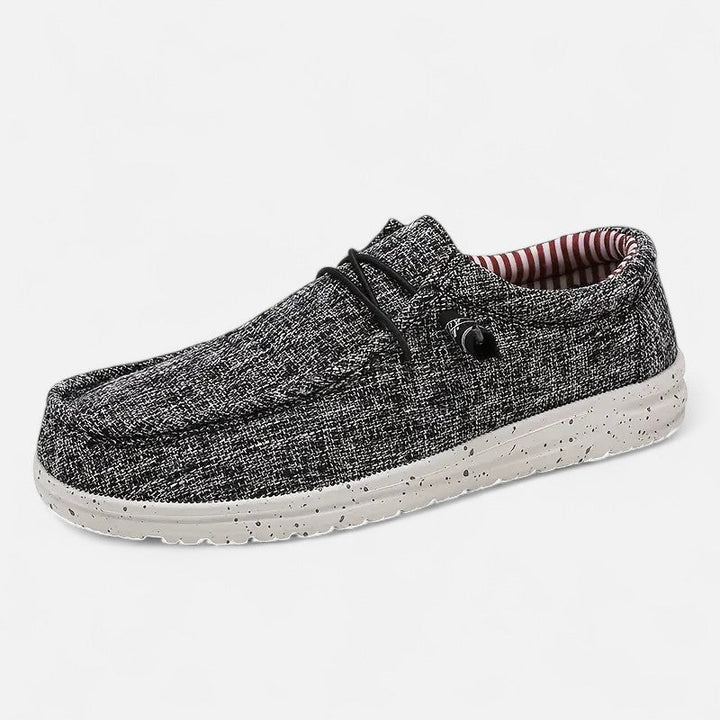 "Mocassins Ariste homme sans lacets, motif drapeau, bleu-gris-noir-kaki, chic et confortable, vue de côté"
