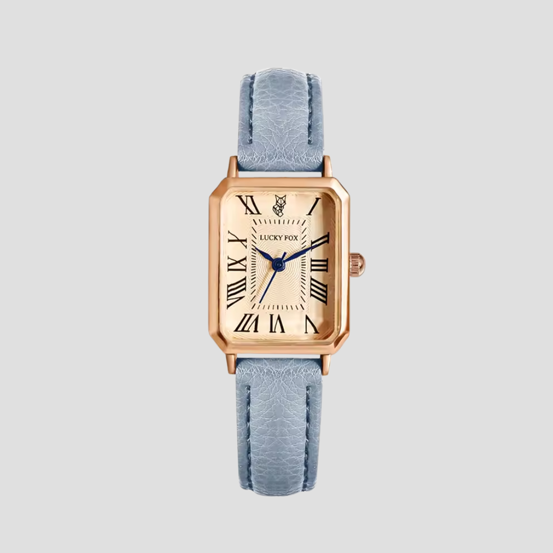 Montre carrée élégante avec boîtier doré et bracelet cuir texturé pour style classique et sophistication féminine.
