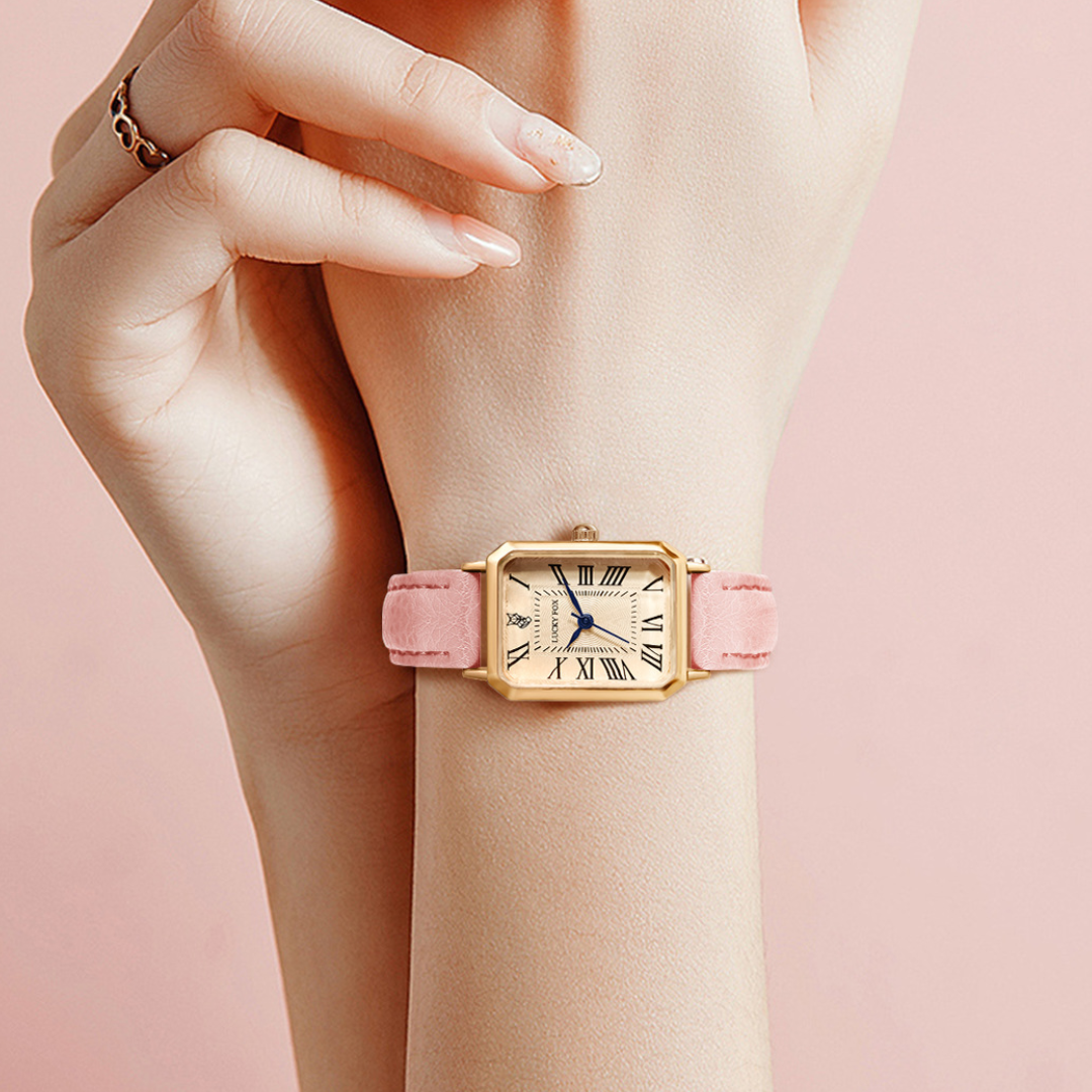 Montre carrée élégante avec boîtier doré et bracelet cuir texturé pour style classique et sophistication féminine.