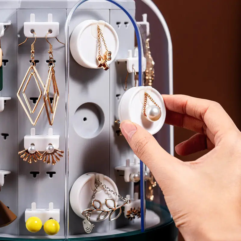 "Organisateur de bijoux rotatif en vert avec 5 tiroirs, design compact moderne, rotation à 360° pour visualisation complète."