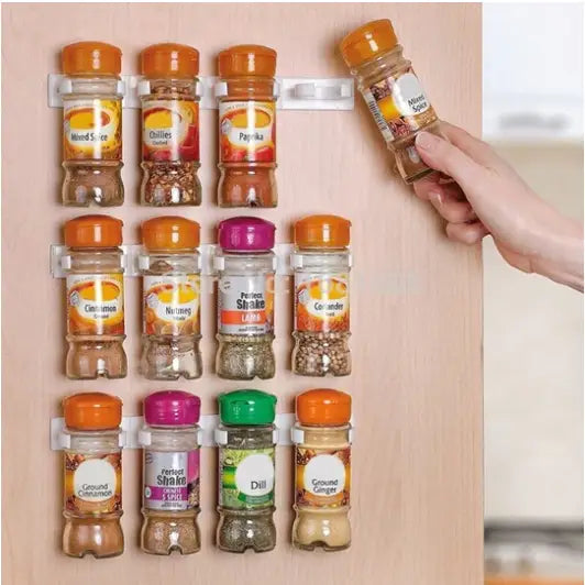 "Organisateur d'épices blanc, clips modulables, design compact pour rangement mural moderne en cuisine."
