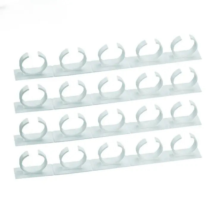 "Organisateur d'épices blanc, clips modulables, design compact pour rangement mural moderne en cuisine."