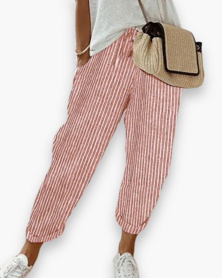 "Pantalon ample femme, tissu léger, style moderne, poches discrètes, taille élastique, coupe élégante, confort optimal"