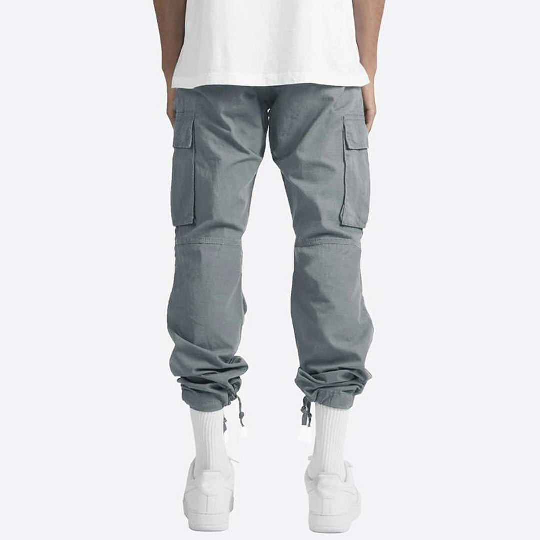 "Pantalon cargo homme chic, couleur variable, coupe moderne, poches multiples pour style et confort optimal."