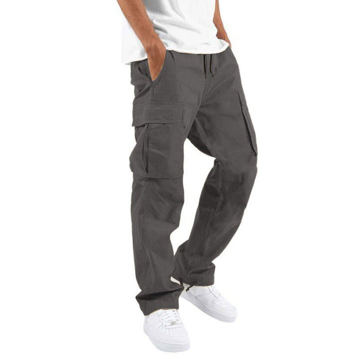 Pantalon cargo homme vert, style utilitaire confortable, coupe droite, poches multiples, idéal pour un look décontracté.
