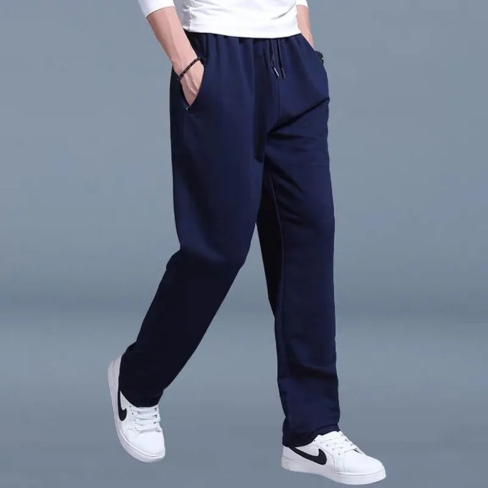 "Pantalon de jogging homme décontracté, coupe droite, couleur unie, taille élastique, tissu doux et léger."