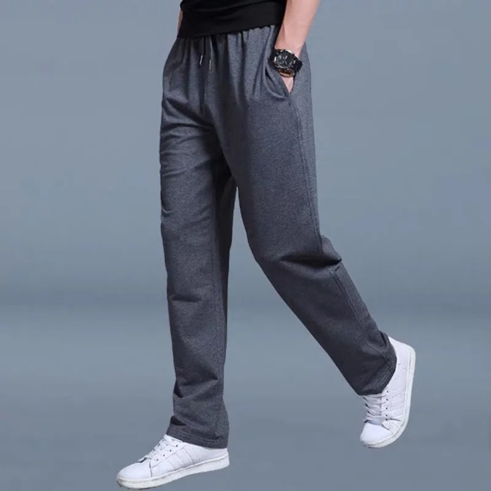 "Pantalon de jogging homme décontracté, coupe droite, couleur unie, taille élastique, tissu doux et léger."