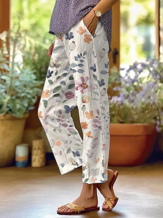Pantalon décontracté ample femme, motif fleuri vibrant, ample et confortable, idéal pour style estival et chic.