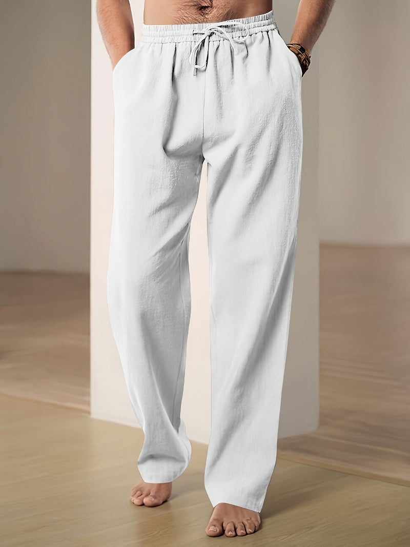 "Pantalon décontracté homme ample, beige avec cordon de serrage et poches, vue de côté, style et confort optimal"