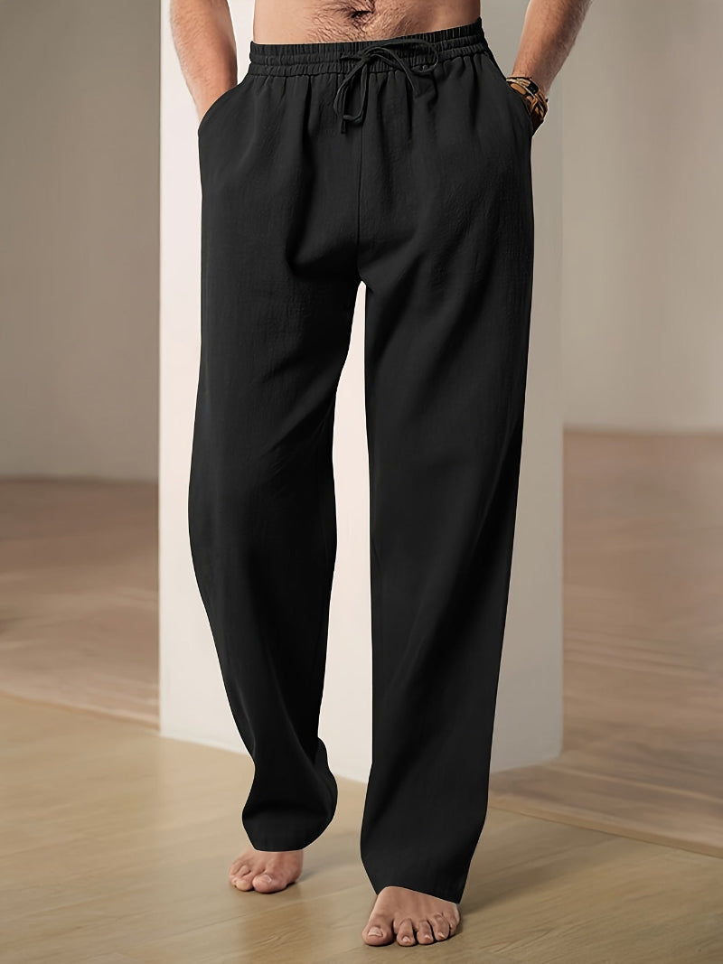 "Pantalon décontracté homme ample, beige avec cordon de serrage et poches, vue de côté, style et confort optimal"