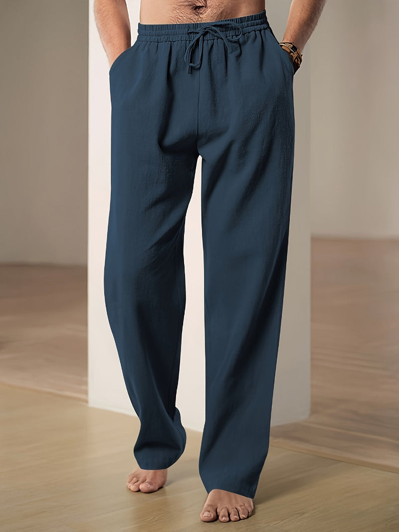 "Pantalon décontracté homme ample, beige avec cordon de serrage et poches, vue de côté, style et confort optimal"