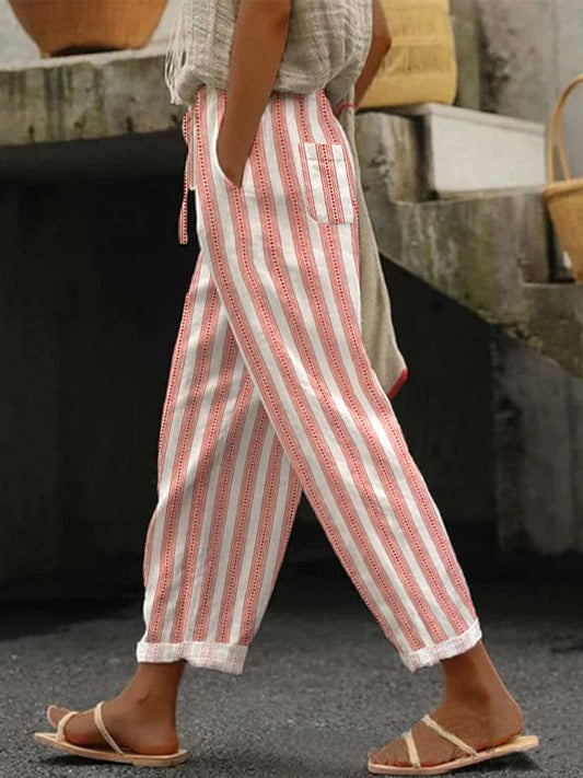 "Pantalon décontracté pour femmes à rayures ethniques, taille élastique, couleur vibrante et coupe ajustée."