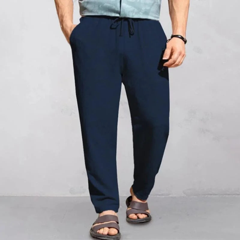 "Pantalon d'été homme en lin léger et respirant, style décontracté, couleur neutre, idéal pour chaud été."