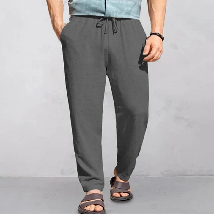 "Pantalon d'été homme en lin léger et respirant, style décontracté, couleur neutre, idéal pour chaud été."