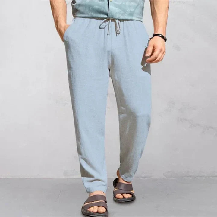 "Pantalon d'été homme en lin léger et respirant, style décontracté, couleur neutre, idéal pour chaud été."