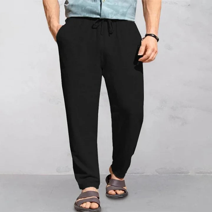 "Pantalon d'été homme en lin léger et respirant, style décontracté, couleur neutre, idéal pour chaud été."