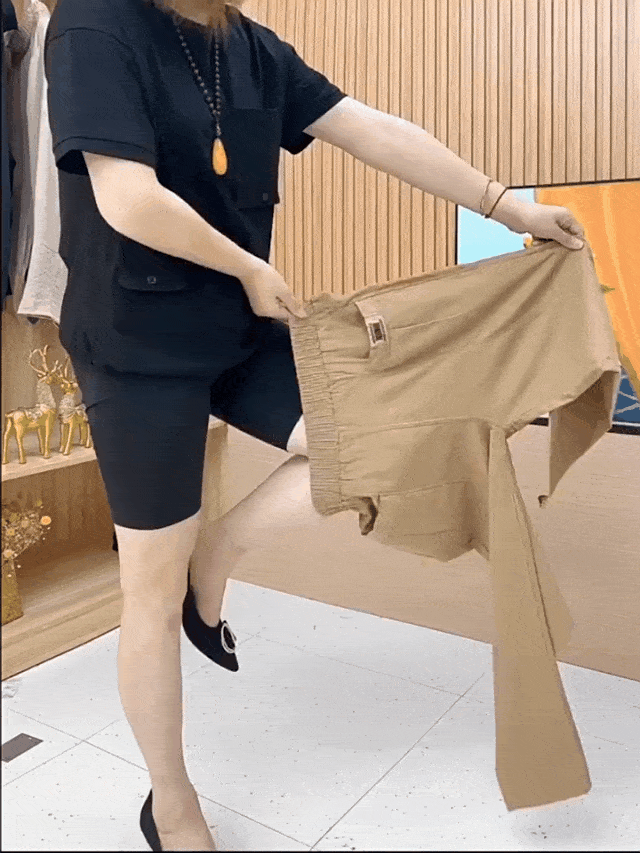 "Pantalon en coton moderne avec ajustement élastique, disponible en beige, noir, kaki, élégant et polyvalent pour femmes."