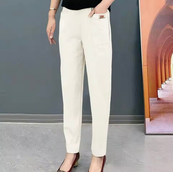 "Pantalon en coton moderne avec ajustement élastique, disponible en beige, noir, kaki, élégant et polyvalent pour femmes."