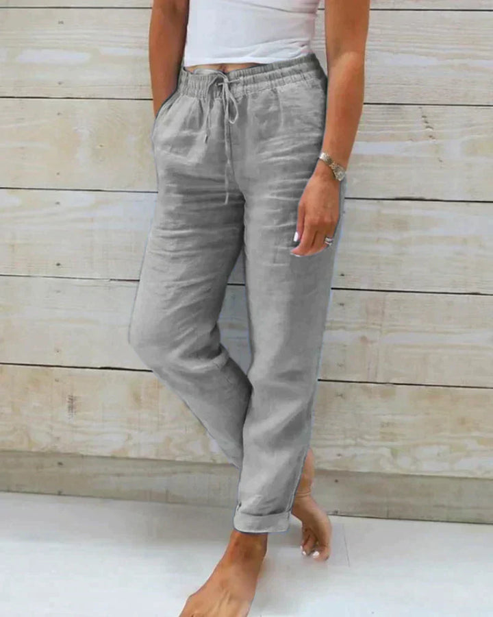 "Pantalon en lin ample et léger pour femme, style décontracté, idéal pour l'été, couleur beige."