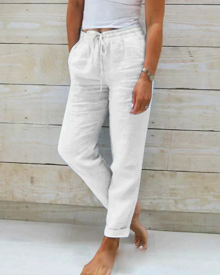 "Pantalon en lin ample et léger pour femme, style décontracté, idéal pour l'été, couleur beige."