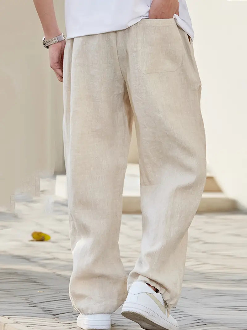 "pantalon en lin ample homme, léger, respirant, design moderne pour confort estival, style décontracté chic"