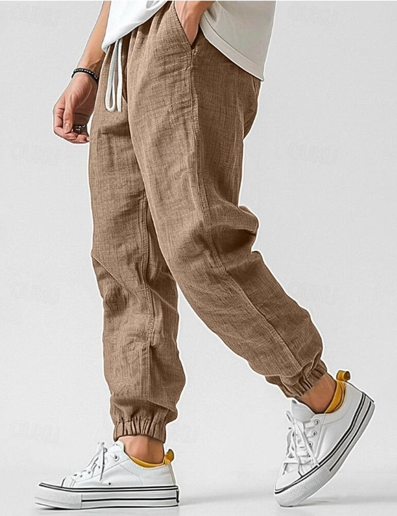 "Pantalon en lin bleu pour hommes, léger et respirant, style décontracté pour l'été, offrant confort et élégance."