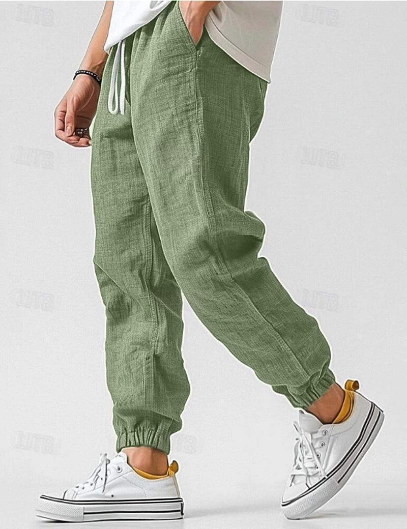 "Pantalon en lin bleu pour hommes, léger et respirant, style décontracté pour l'été, offrant confort et élégance."