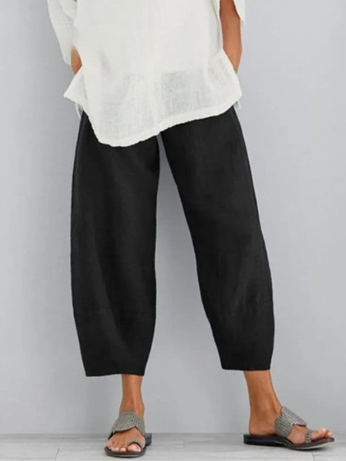 Pantalon en lin femme, coupe ample, couleur ivoire, léger et respirant, idéal pour un style décontracté et estival.