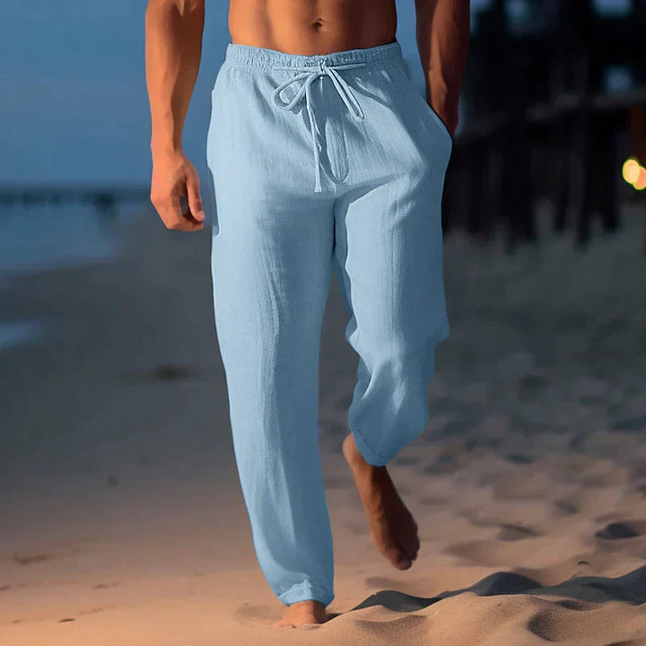 Pantalon en lin homme léger, moderne, gris, coupe décontractée, parfait pour l'été, tissu respirant, style chic.