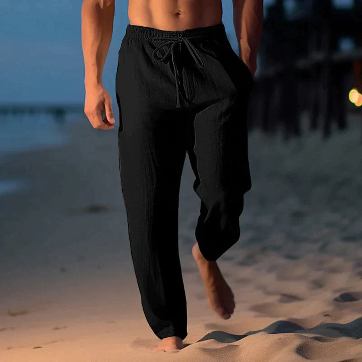 Pantalon en lin homme léger, moderne, gris, coupe décontractée, parfait pour l'été, tissu respirant, style chic.