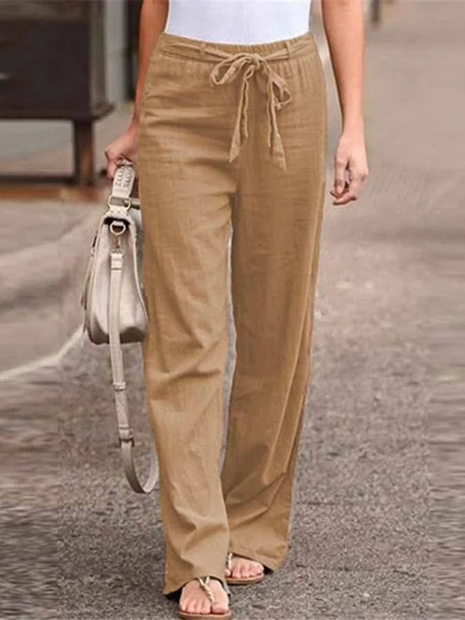"Pantalon en lin léger et élégant pour femmes, coupe ample, ceinture ajustable, idéal pour l'été et les looks décontractés."
