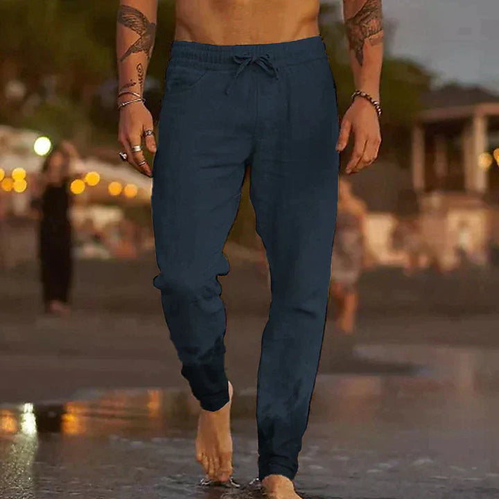 "Pantalon en lin léger pour hommes, coupe décontractée, disponible en beige, blanc, bleu, gris et noir, parfait pour l'été."