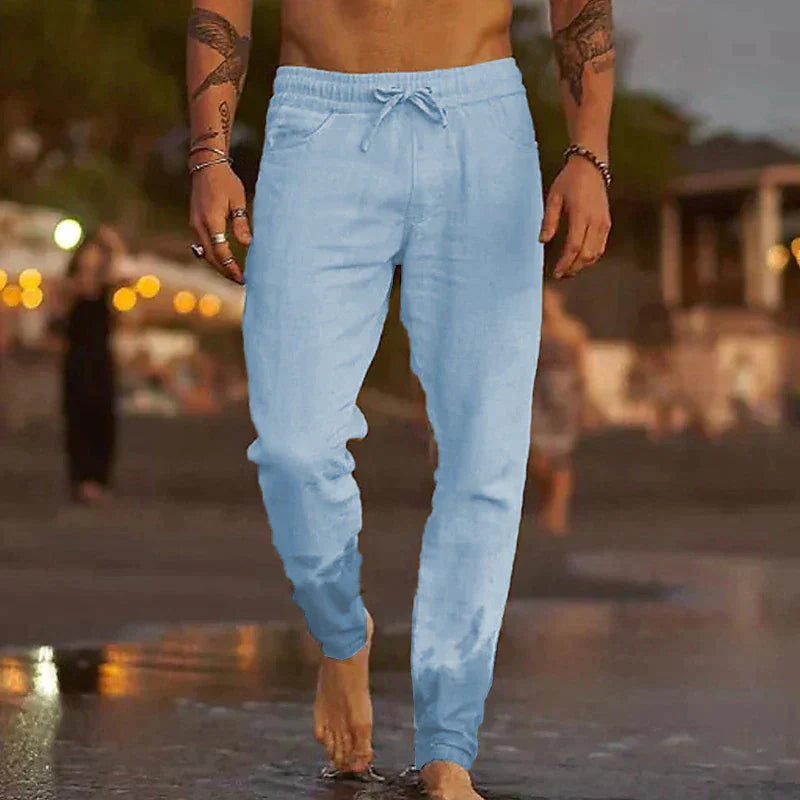 "Pantalon en lin léger pour hommes, coupe décontractée, disponible en beige, blanc, bleu, gris et noir, parfait pour l'été."