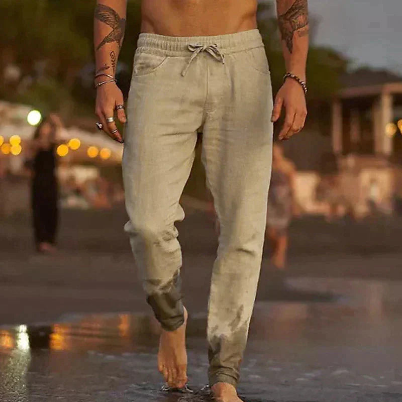 "Pantalon en lin léger pour hommes, coupe décontractée, disponible en beige, blanc, bleu, gris et noir, parfait pour l'été."