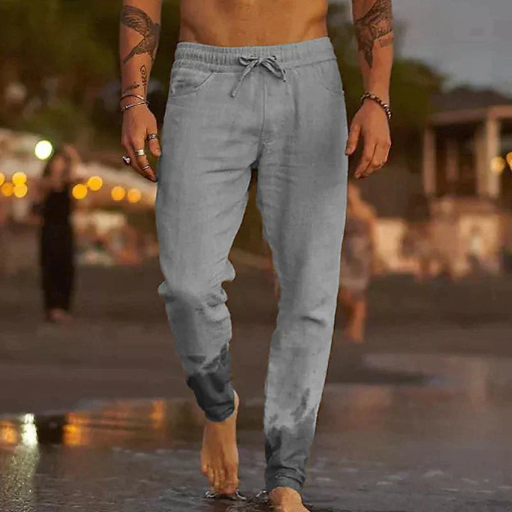 "Pantalon en lin léger pour hommes, coupe décontractée, disponible en beige, blanc, bleu, gris et noir, parfait pour l'été."