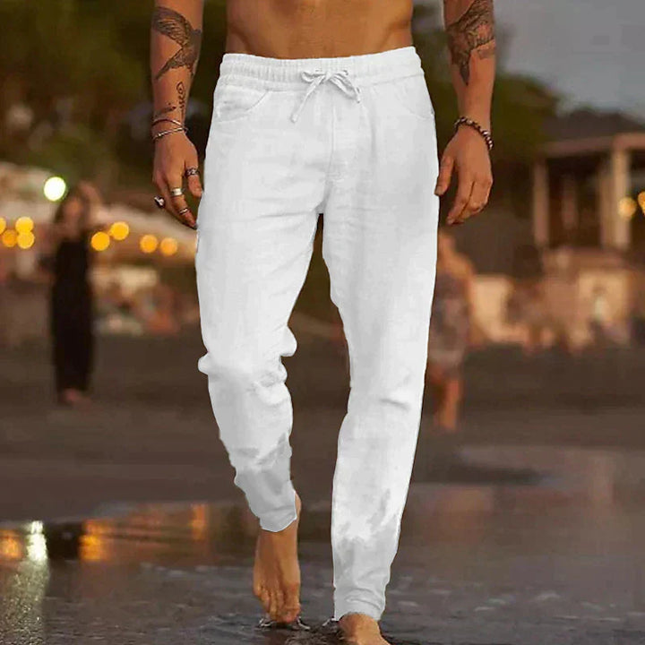 "Pantalon en lin léger pour hommes, coupe décontractée, disponible en beige, blanc, bleu, gris et noir, parfait pour l'été."