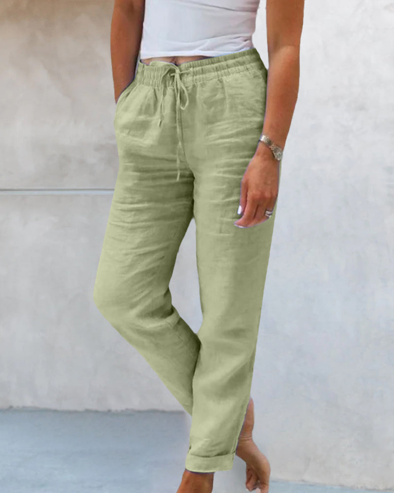 "Pantalon en lin pour femme élégant, confortable, taille haute, jambe droite, idéal pour printemps et été."