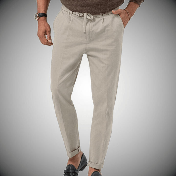 "Pantalon en lin pour homme, élégant et confortable, vue de face, coupe moderne, couleur beige."