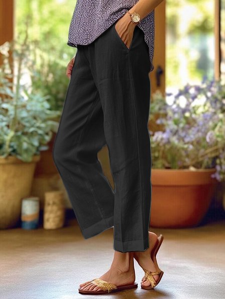 "Pantalon femme ample en lin Lotte, léger et estival, coupe ample et design uni, idéal pour les journées chaudes."