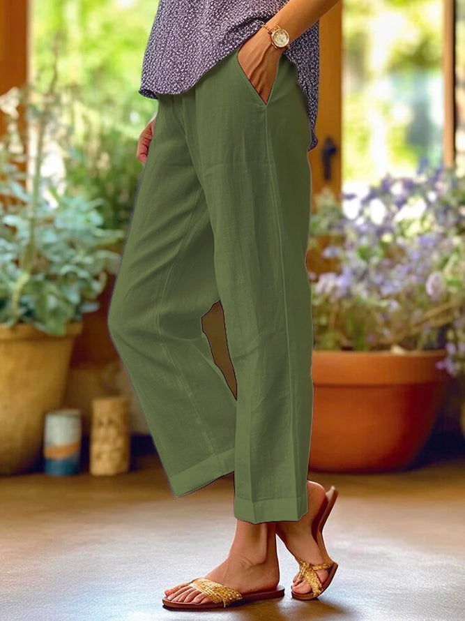 "Pantalon femme ample en lin Lotte, léger et estival, coupe ample et design uni, idéal pour les journées chaudes."
