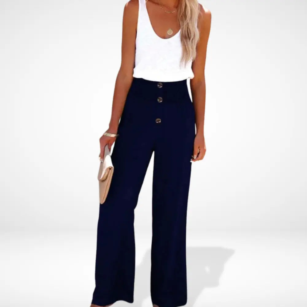 "Pantalon femme ample taille froncée, détails boutons, coupe fluide et élégante, style moderne et confortable."