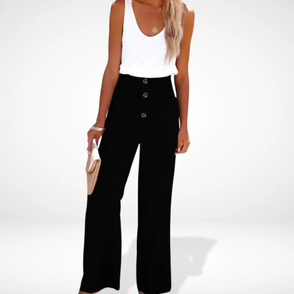 "Pantalon femme ample taille froncée, détails boutons, coupe fluide et élégante, style moderne et confortable."