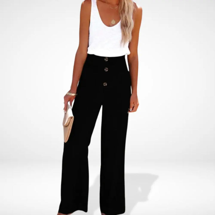 "Pantalon femme ample taille froncée, détails boutons, coupe fluide et élégante, style moderne et confortable."