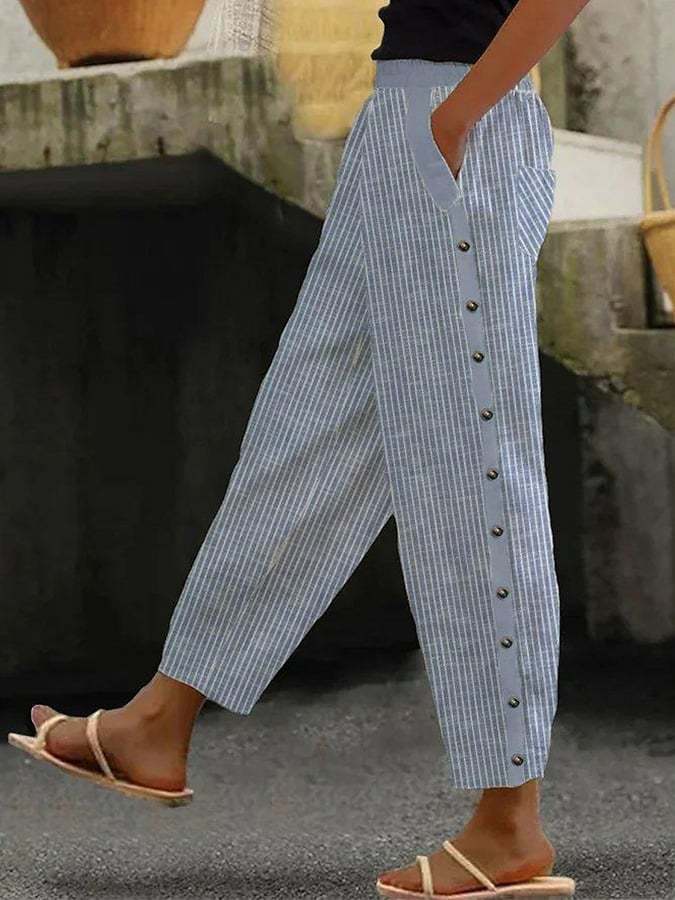 "Pantalon femme rayures fines, coupe confortable et élégante, affine la silhouette, idéal pour toutes occasions."