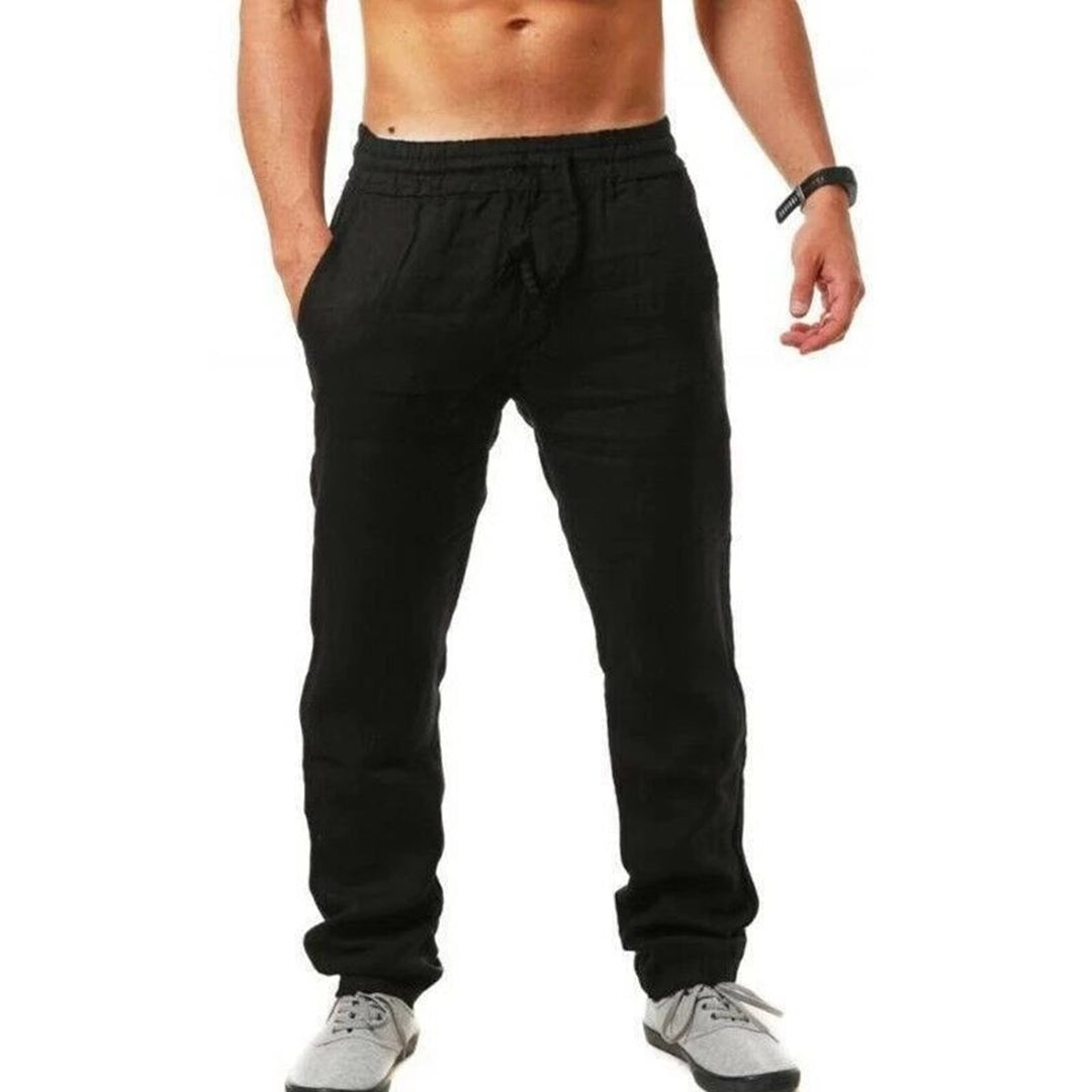 "Pantalon homme lin léger, gris, style décontracté chic, idéal été, plage ou ville, look élégant et aéré."