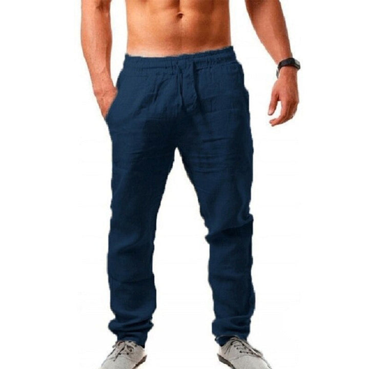 "Pantalon homme lin léger, gris, style décontracté chic, idéal été, plage ou ville, look élégant et aéré."
