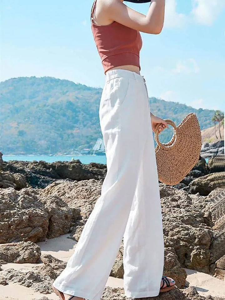 "Pantalon large décontracté en lin léger pour femme, style estival, disponible en beige, blanc et noir."